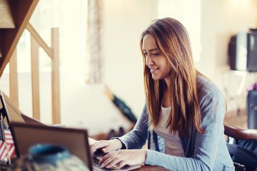 Woman working on lap top